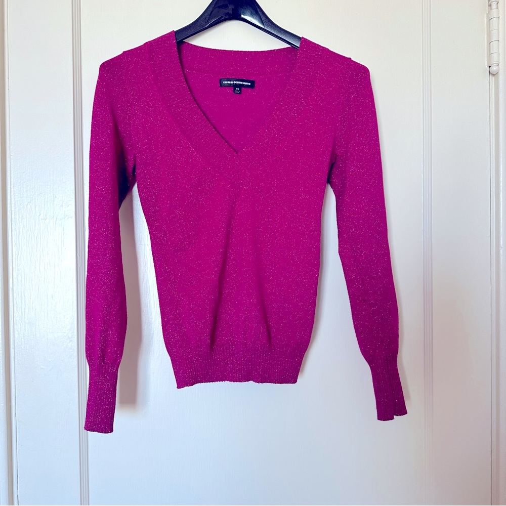 Woman’s sparkly V-neck sweater
